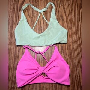 Neon green and pink sports bras